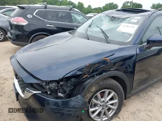 2023 Mazda CX-5 S Carbon Edition z VIN JM3KFBCM6P0251947, wystawiony jako IAAI lot #42286595 z przebiegiem 9 434 mil mil oraz . Historia ofert i sprzedaży dostępna na DreamBid. Obrazek 6.