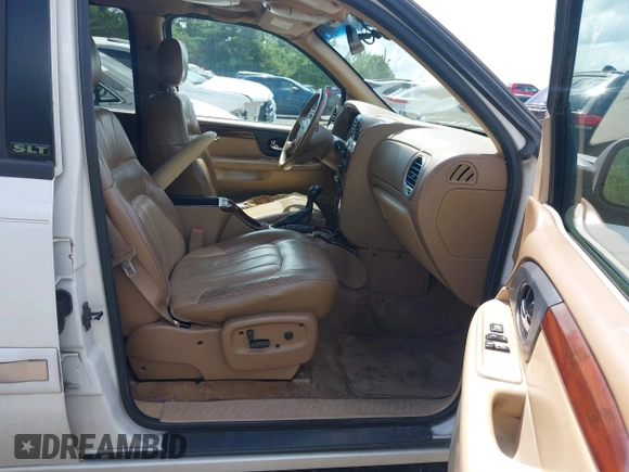 2003 GMC Envoy SLT with VIN 1GKDS13S632266506, listed as a IAAI auction lot 42149049 with 259,884 mi miles and . Bid and sale history available at DreamBid. Image 5.