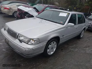 1998 Volvo S90 with VIN YV1KS9600W1129240, listed as a IAAI auction lot 41564419 with 131,225 mi miles. Bid and sale history available at carsss.com. Image 2.