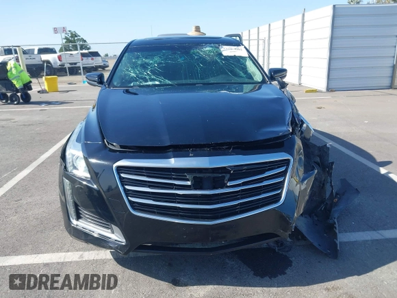 2016 Cadillac CTS Luxury Collection RWD z VIN 1G6AR5SS8G0156144, wystawiony jako IAAI lot #42087602 z przebiegiem Nie podano mil oraz . Historia ofert i sprzedaży dostępna na DreamBid. Obrazek 12.