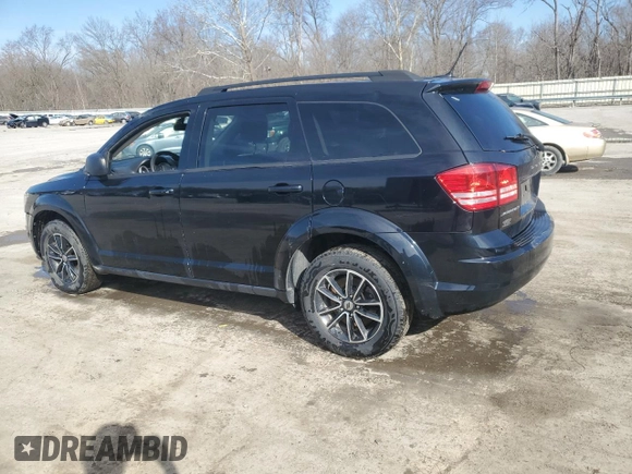 2018 Dodge Journey SE with VIN 3C4PDCABXJT242593, listed as a Copart auction lot 49830085 with 176,553 mi miles and Salvage Title. Bid and sale history available at carsss.com. Image 2.