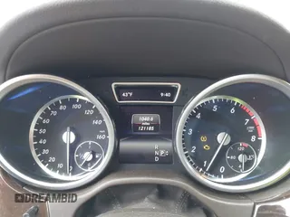 2015 Mercedes-Benz GL-Class GL 450 with VIN 4JGDF6EE9FA513009, listed as a IAAI auction lot 41311164 with 121,185 mi miles. Bid and sale history available at carsss.com. Image 7.
