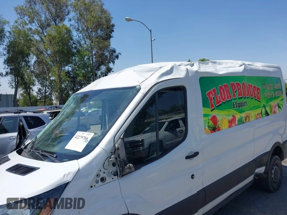 2015 Ford Transit Cargo with VIN 1FTNR2CM6FKB21974, listed as a IAAI auction lot 42279766 with 254,124 mi miles and . Bid and sale history available at DreamBid. Image 12.