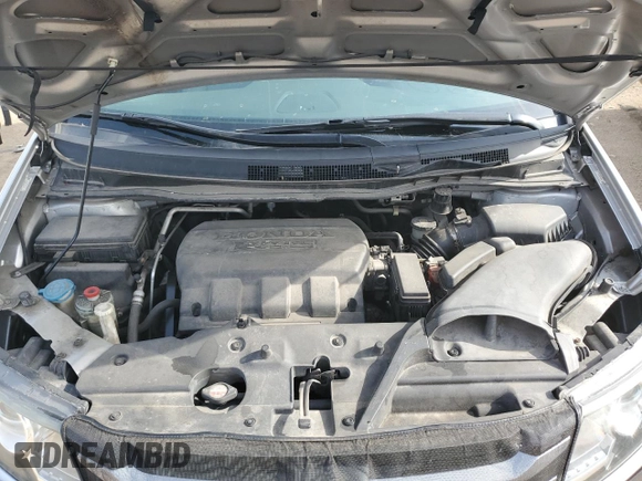 2014 Honda Odyssey Touring with VIN 5FNRL5H93EB034263, listed as a Copart auction lot 57254485 with 150,084 mi miles and Salvage title. Bid and sale history available at DreamBid. Image 12.