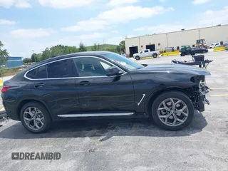 2024 BMW X4 xDrive30i z VIN 5UX33DT09R9W67695, wystawiony jako IAAI lot #42087562 z przebiegiem 20 324 mil mil oraz . Historia ofert i sprzedaży dostępna na DreamBid. Obrazek 14.