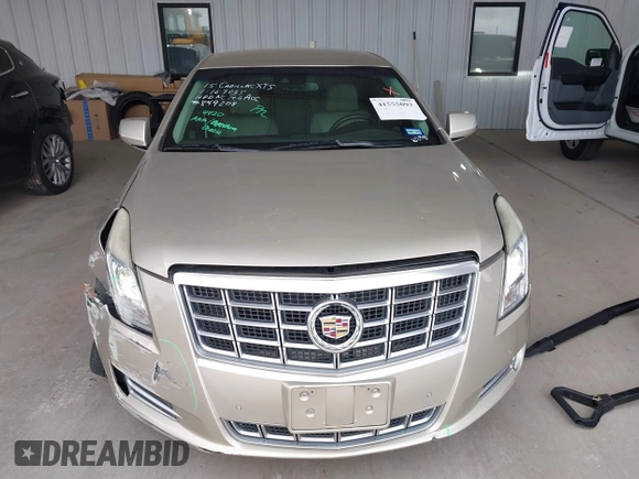 2015 Cadillac XTS Luxury z VIN 2G61M5S39F9246298, wystawiony jako IAAI lot #41555093 z przebiegiem 126 928 mil mil oraz . Historia ofert i sprzedaży dostępna na DreamBid. Obrazek 12.