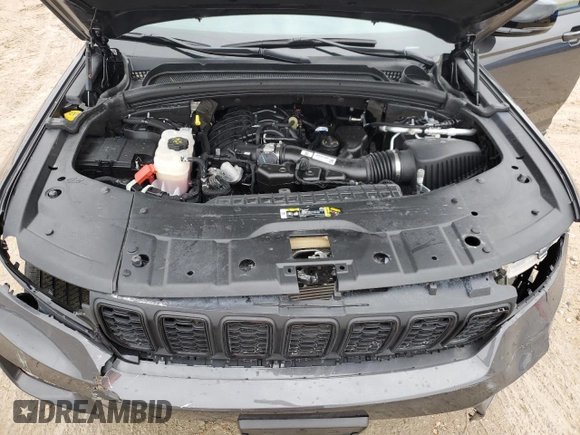 2023 Jeep Grand Cherokee Altitude with VIN 1C4RJGAG7PC573429, listed as a Copart auction lot 42961295 with 9,704 mi miles and Salvage title. Bid and sale history available at DreamBid. Image 12.