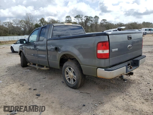 2005 Ford F-150 STX with VIN 1FTRX12W45NB42078, listed as a Copart auction lot 48613525 with 215,237 mi miles and Salvage Title. Bid and sale history available at carsss.com. Image 2.
