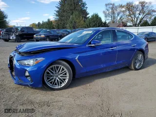 2020 Genesis G70 2.0T with VIN KMTG34LA5LU047721, listed as a Copart auction lot 74009343 with 34,676 mi miles. Bid and sale history available at carsss.com. Image 1.
