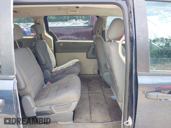 2008 Dodge Grand Caravan SE with VIN 1D8HN44H78B167114, listed as a IAAI auction lot 42542391 with 170,153 mi miles and . Bid and sale history available at DreamBid. Image 8.