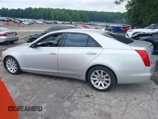 2014 Cadillac CTS Luxury RWD z VIN 1G6AR5S38E0173628, wystawiony jako IAAI lot #42343647 z przebiegiem 166 035 mil mil oraz . Historia ofert i sprzedaży dostępna na DreamBid. Obrazek 14.
