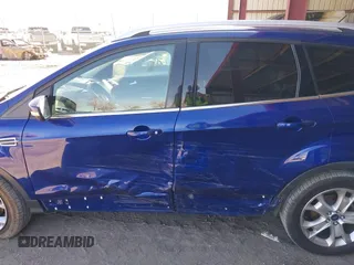 2016 Ford Escape Titanium with VIN 1FMCU9JXXGUB58961, listed as a IAAI auction lot 41772977 with 122,665 mi miles. Bid and sale history available at carsss.com. Image 14.