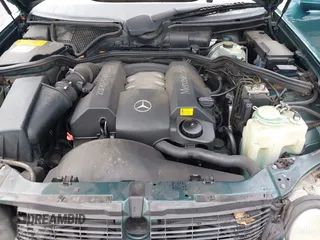 1998 Mercedes-Benz E-Class with VIN WDBJF65FXWA589630, listed as a IAAI auction lot 41990725 with 102,149 mi miles. Bid and sale history available at carsss.com. Image 10.