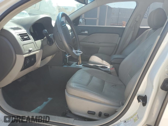 2012 Ford Fusion SEL z VIN 3FAHP0JA3CR336743, wystawiony jako Copart lot #45455065 z przebiegiem 126 456 mil mil oraz Szkody całkowita. Historia ofert i sprzedaży dostępna na DreamBid. Obrazek 7.