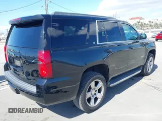 2016 Chevrolet Tahoe LT with VIN 1GNSCBKC3GR446014, listed as a IAAI auction lot 42248329 with 122,306 mi miles and . Bid and sale history available at DreamBid. Image 4.