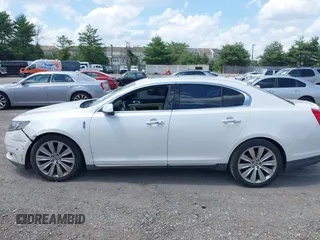 2013 Lincoln MKS EcoBoost with VIN 1LNHL9FT0DG606567, listed as a IAAI auction lot 42561162 with 285,830 mi miles and . Bid and sale history available at DreamBid. Image 14.