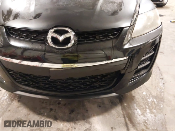 2010 Mazda CX-7 Sport z VIN JM3ER2W55A0340585, wystawiony jako IAAI lot #42167429 z przebiegiem 145 517 mil mil oraz . Historia ofert i sprzedaży dostępna na DreamBid. Obrazek 18.