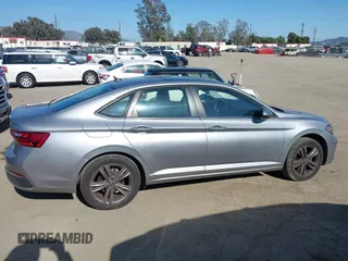 2022 Volkswagen Jetta SE with VIN 3VW7M7BU1NM019993, listed as a IAAI auction lot 42087376 with 74,596 mi miles and . Bid and sale history available at DreamBid. Image 13.