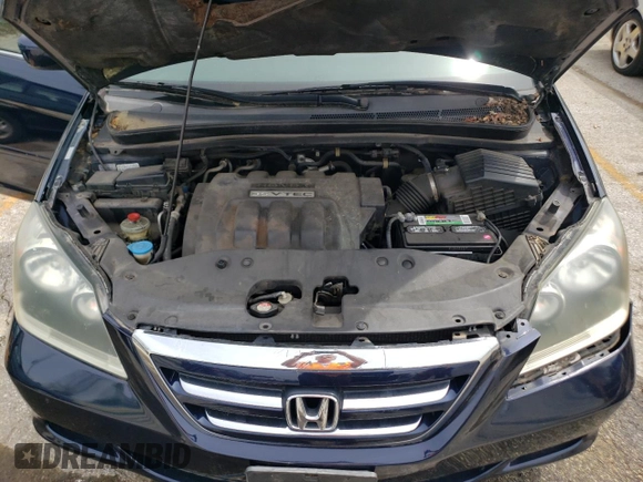 2007 Honda Odyssey EX with VIN 5FNRL38477B101619, listed as a Copart auction lot 54134505 with 129,468 mi miles and Clean title. Bid and sale history available at DreamBid. Image 12.