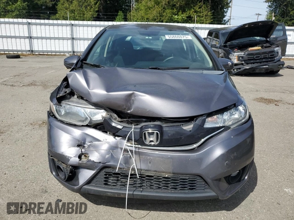 2015 Honda Fit EX-L with VIN 3HGGK5H80FM767970, listed as a Copart auction lot 55866075 with 64,435 mi miles and Salvage Title. Bid and sale history available at DreamBid. Image 5.