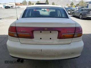 2002 Saturn LS z VIN 1G8JW54R72Y576434, wystawiony jako Copart lot #55029305 z przebiegiem 135 613 mil mil oraz Szkody całkowita. Historia ofert i sprzedaży dostępna na DreamBid. Obrazek 6.