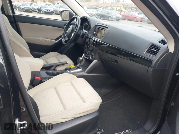 2015 Mazda CX-5 Touring with VIN JM3KE4CY2F0445178, listed as a IAAI auction lot 41828953 with 137,330 mi miles and . Bid and sale history available at DreamBid. Image 5.