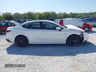2025 Toyota Camry LE with VIN 4T1DAACK0SU551828, listed as a IAAI auction lot 41823385 with Not Provided miles and . Bid and sale history available at DreamBid. Image 13.