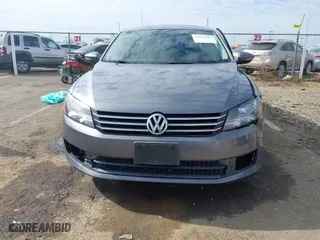 2012 Volkswagen Passat SE with VIN 1VWBP7A35CC024137, listed as a IAAI auction lot 41572782 with 138,827 mi miles. Bid and sale history available at carsss.com. Image 12.
