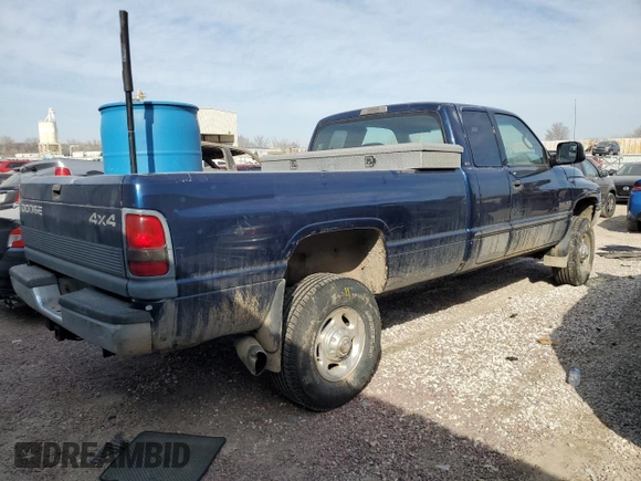 2000 Dodge 2500 with VIN 3B7KF2362YG132087, listed as a Copart auction lot 48668925 with 358,326 mi miles and Salvage title. Bid and sale history available at DreamBid. Image 3.