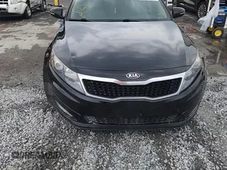 2013 Kia Optima EX z VIN 5XXGN4A79DG162815, wystawiony jako Copart lot #59282275 z przebiegiem 163 920 mil mil oraz Szkoda całkowita • Salvage title. Historia ofert i sprzedaży dostępna na DreamBid. Obrazek 13.