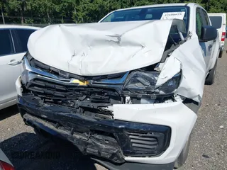 2021 Chevrolet Colorado 4WD Work Truck with VIN 1GCGTBEN0M1233723, listed as a IAAI auction lot 42600025 with 58,906 mi miles and . Bid and sale history available at DreamBid. Image 6.