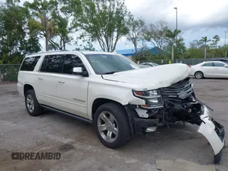 2015 Chevrolet Suburban LTZ with VIN 1GNSKKKC4FR687923, listed as a IAAI auction lot 42192062 with 139,873 mi miles and . Bid and sale history available at DreamBid. Image 1.