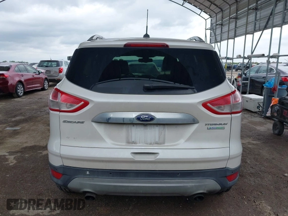2015 Ford Escape Titanium z VIN 1FMCU0J91FUA27610, wystawiony jako IAAI lot #42095995 z przebiegiem 122 521 mil mil oraz . Historia ofert i sprzedaży dostępna na DreamBid. Obrazek 17.