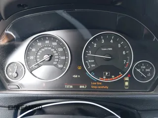 2015 BMW 3 Series 320i with VIN WBA3B1G52FNT63889, listed as a IAAI auction lot 41717925 with 73,736 mi miles. Bid and sale history available at carsss.com. Image 7.