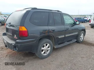2003 GMC Envoy SLT with VIN 1GKDT13S632197541, listed as a IAAI auction lot 42178695 with 221,189 mi miles and . Bid and sale history available at DreamBid. Image 4.