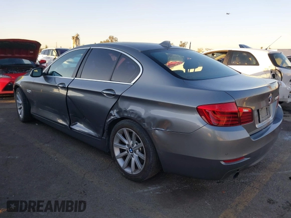 2014 BMW 5 Series 535i with VIN WBA5B1C54ED479873, listed as a IAAI auction lot 41338061 with 75,097 mi miles and . Bid and sale history available at DreamBid. Image 3.