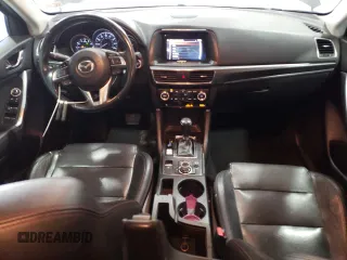 2016 Mazda CX-5 Grand Touring with VIN JM3KE4DY8G0616421, listed as a Copart auction lot 50884525 with 182,048 mi miles and Salvage Title. Bid and sale history available at DreamBid. Image 8.