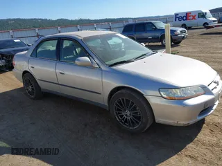 1999 Honda Accord LX with VIN JHMCG5648XC004479, listed as a IAAI auction lot 42719444 with 170,246 mi miles and . Bid and sale history available at DreamBid. Image 1.