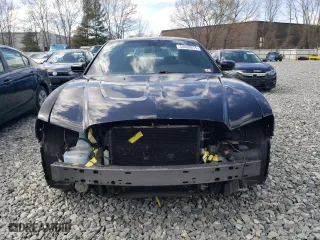 2014 Dodge Charger SE with VIN 2C3CDXBG9EH349301, listed as a Copart auction lot 54000015 with 210,349 mi miles and Clean Title. Bid and sale history available at carsss.com. Image 5.