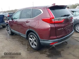2017 Honda CR-V EX with VIN 2HKRW2H53HH679990, listed as a IAAI auction lot 41923591 with 242,177 mi miles. Bid and sale history available at carsss.com. Image 3.