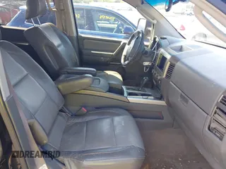 2005 Nissan Titan LE with VIN 1N6AA07B05N509859, listed as a IAAI auction lot 42662424 with 252,000 mi miles and . Bid and sale history available at DreamBid. Image 5.