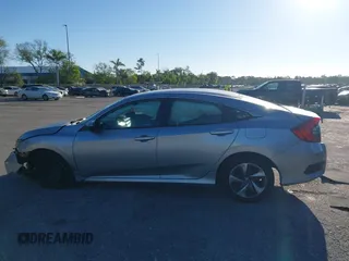 2020 Honda Civic LX with VIN 19XFC2F63LE004953, listed as a IAAI auction lot 41824922 with 71,458 mi miles and . Bid and sale history available at DreamBid. Image 14.