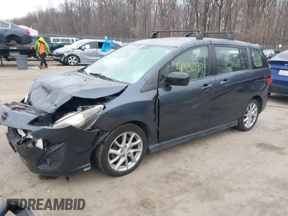 2012 Mazda 5 Touring with VIN JM1CW2CL6C0107233, listed as a IAAI auction lot 41332199 with 130,428 mi miles and . Bid and sale history available at DreamBid. Image 2.