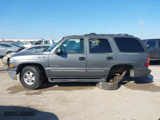 2002 Chevrolet Tahoe LT with VIN 1GNEC13Z12J233208, listed as a IAAI auction lot 41659873 with 238,922 mi miles. Bid and sale history available at carsss.com. Image 14.