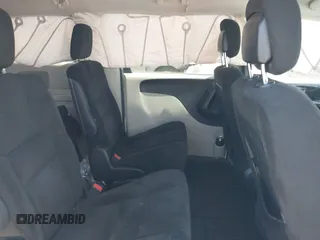 2014 Dodge Grand Caravan SXT with VIN 2C4RDGCG1ER429495, listed as a IAAI auction lot 42058513 with 136,936 mi miles and . Bid and sale history available at DreamBid. Image 8.