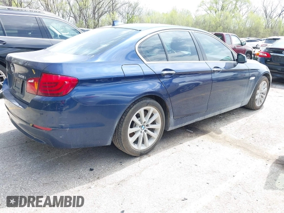 2013 BMW 5 Series 528i xDrive with VIN WBAXH5C52DD107297, listed as a IAAI auction lot 42004619 with 182,805 mi miles. Bid and sale history available at carsss.com. Image 4.