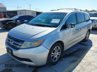2012 Honda Odyssey EX with VIN 5FNRL5H48CB131881, listed as a IAAI auction lot 41822159 with 354,718 mi miles and . Bid and sale history available at DreamBid. Image 2.