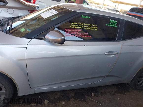 2012 Hyundai Veloster w/Black Int z VIN KMHTC6AD2CU052067, wystawiony jako IAAI lot #42261316 z przebiegiem 187 234 mil mil oraz . Historia ofert i sprzedaży dostępna na DreamBid. Obrazek 14.