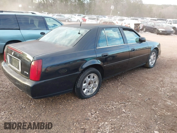 2002 Cadillac DeVille DTS with VIN 1G6KF57992U219921, listed as a IAAI auction lot 41261360 with 127,710 mi miles. Bid and sale history available at carsss.com. Image 4.