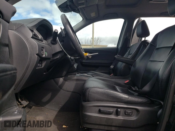2017 Honda Pilot Touring with VIN 5FNYF6H90HB028112, listed as a Copart auction lot 52197645 with 218,944 mi miles and Salvage Title. Bid and sale history available at DreamBid. Image 7.